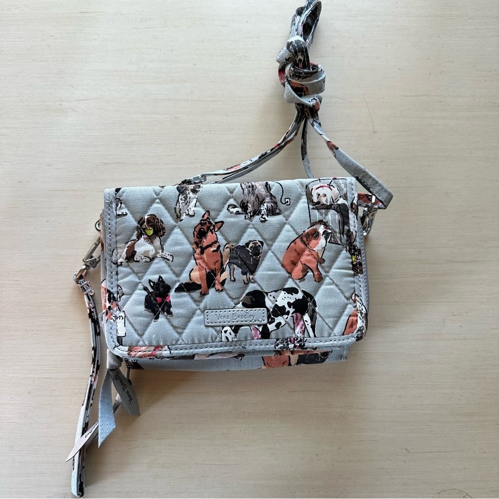 Vera Bradley Dog collection wallet with crossbody strap.